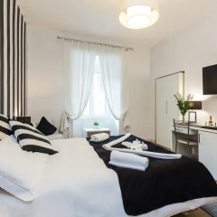 Отель Rione Monti Suites Стандартный номер с двуспальной кроватью