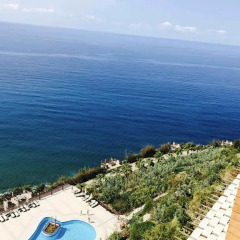 Отель Luxury Apt in Konak Sea Side with a Sea front view and a private beach пляж