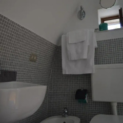 Отель Casa DeCarlo B&B Альберобелло ванная