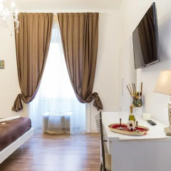Отель Rione Monti Suites Стандартный номер с двуспальной кроватью фото 24