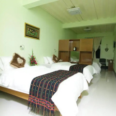 Deluxe Hotel комната для гостей