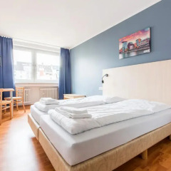 Отель a&o Düsseldorf Hauptbahnhof 2* Стандартный номер с разными типами кроватей фото 3