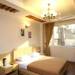 Hotel TJS Grand комната для гостей