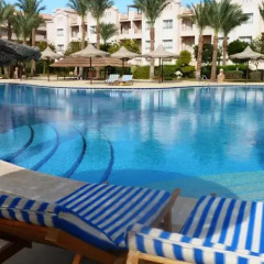 Апартаменты Sunset Pearl Apartments бассейн