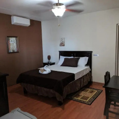 Отель Rockhampton Retreat Guest House 3* Люкс с различными типами кроватей