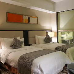 Junyue Internation Hotel 3* Номер Бизнес с 2 отдельными кроватями фото 2