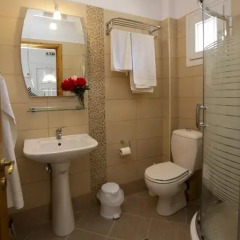 Отель Mythos Bungalows ванная
