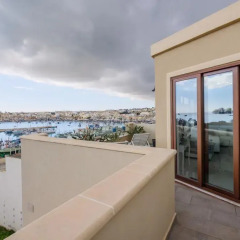 Отель Penthouse in Marsaxlokk Мальта, Марсашлокк - отзывы, цены и фото номеров - забронировать отель Penthouse in Marsaxlokk онлайн балкон