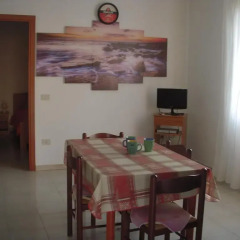 Отель Appartamento La Caletta Синискола в номере фото 2