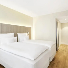 Отель NH Collection Hamburg City 4* Улучшенный номер разные типы кроватей фото 2