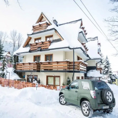 Отель Apartamenty Pod Skocznią z kominkiem i tarasem парковка
