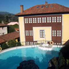 Отель Apartamentos La Casona De Vidiago бассейн фото 3