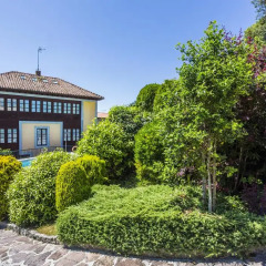 Отель Apartamentos La Casona De Vidiago