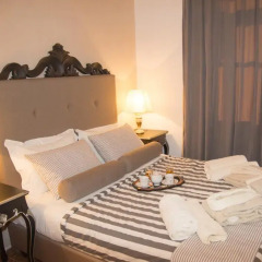 Отель Porto Enetiko Suites Улучшенные апартаменты с различными типами кроватей фото 3