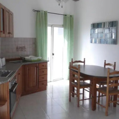 Отель Hideaway Flats в номере