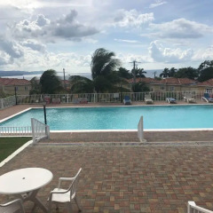 Отель Mango Walk Country Club Suites бассейн