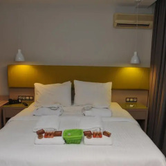 Elements Hotel Apartments комната для гостей