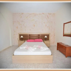 Апартаменты Anna Christina Apartments Метаморфоси комната для гостей фото 2