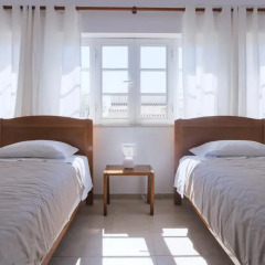 Отель Flow House - Guesthouse Surf Kite Surf School 3* Стандартный номер 2 отдельные кровати (общая ванная комната) фото 3