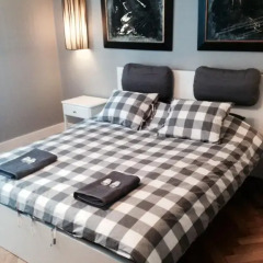 Апартаменты Goodnight Warsaw Apartments Poznanska 11 комната для гостей