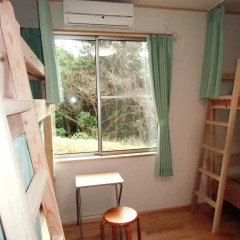 Отель Guesthouse Yakushima Якусима комната для гостей фото 5
