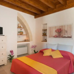 Отель Grandi Trulli Bed & Breakfast Альберобелло комната для гостей фото 5