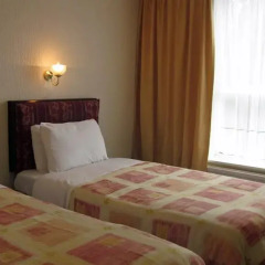 Отель The Ram's Lodge 2* Стандартный номер с 2 отдельными кроватями фото 5