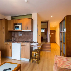 Отель Astuy Apartamentos Арнуэро в номере