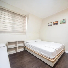 Хостел Itaewon Inn Стандартный номер с 2 отдельными кроватями фото 9