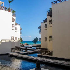 Отель Aldea Thai by Ocean Front Плая-дель-Кармен приотельная территория