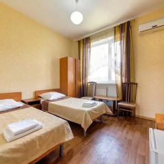 Гостиница Кузбасс комната для гостей фото 2