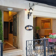 Отель Royem Suites вид на фасад фото 2