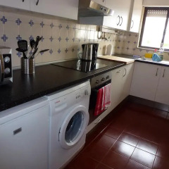 Отель Alveiros Apartamentos Praia dos Aveiros в номере