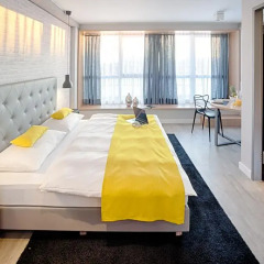 Апартаменты Mloft Apartments Munchen Мюнхен комната для гостей фото 15