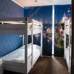 Hostel Green House Tyumen Кровать в общем номере с двухъярусной кроватью фото 15
