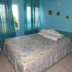 Отель Unforgettable Villas By The Sea Треже-Бич комната для гостей фото 3