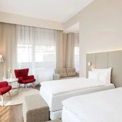 Отель NH Collection Berlin Mitte Friedrichstrasse 4* Улучшенный номер с двуспальной кроватью фото 3