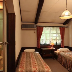 Отель Lodge Karunaju & The Alpine Grill Хакуба спа