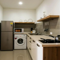 Отель Beach 7 Condo by GrandisVillas Паттайя в номере
