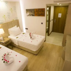 Отель Liberty Hotels Oludeniz 4* Улучшенный номер с двуспальной кроватью фото 10