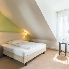 Отель Ramada by Wyndham München Airport 3* Стандартный номер разные типы кроватей фото 3