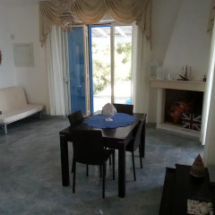 Отель Cala Luna Holiday Home Гальяно дель Капо в номере
