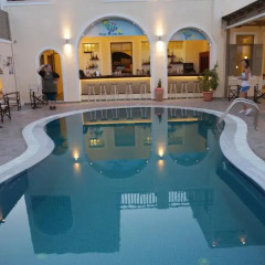 Отель Enjoy Villas Греция, Остров Санторини - 1 отзыв об отеле, цены и фото номеров - забронировать отель Enjoy Villas онлайн бассейн фото 3