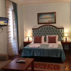 Апартаменты Tashkonak Sultan Suites and Apartments Люкс с различными типами кроватей фото 32
