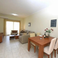 Апартаменты Nefeli Apartment комната для гостей