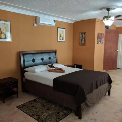 Отель Rockhampton Retreat Guest House 3* Люкс повышенной комфортности с различными типами кроватей фото 2