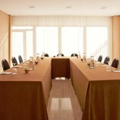 NH Suites Prisma Hotel
