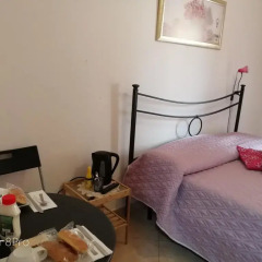 Отель La Perla B&B удобства в номере