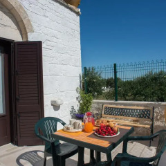 Отель Grandi Trulli Bed & Breakfast Альберобелло балкон