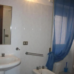 Отель Le Onde Residence Кастельсардо ванная